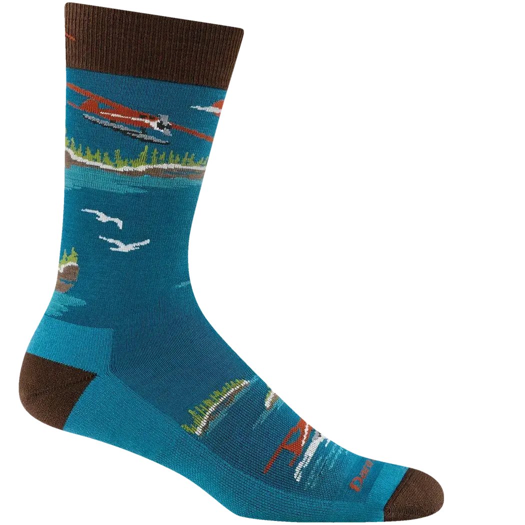 Side view of the Darn Tough Men's Float Boat Crew Lightweight With Cushion socks in Midnight showing the boat and seagulls design against a white background.