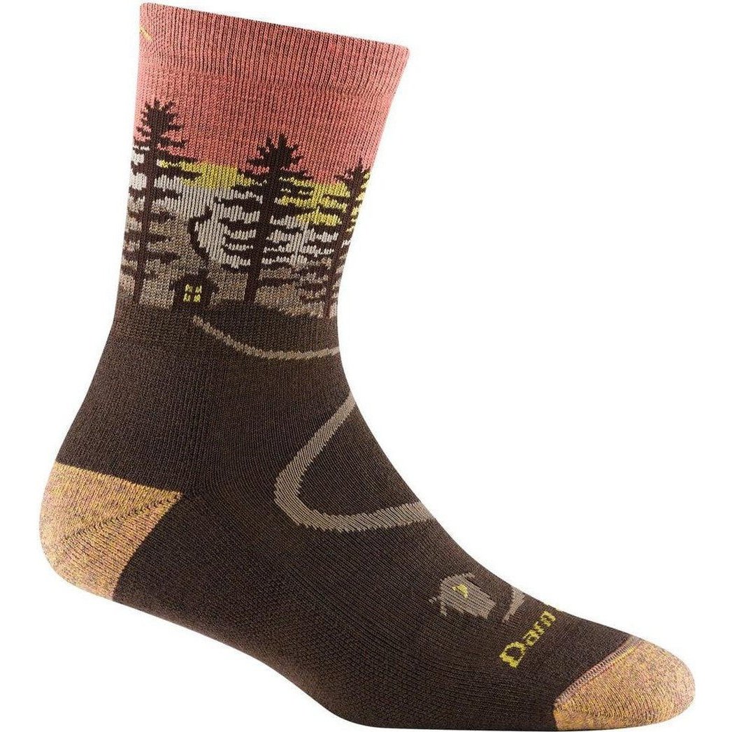 A side view of the Darn Tough Northwoods Micro Crew Midweight with Cushion socks in Earth color showing the tree and cabin design on a white background.