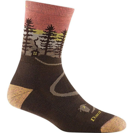 A side view of the Darn Tough Northwoods Micro Crew Midweight with Cushion socks in Earth color showing the tree and cabin design on a white background.