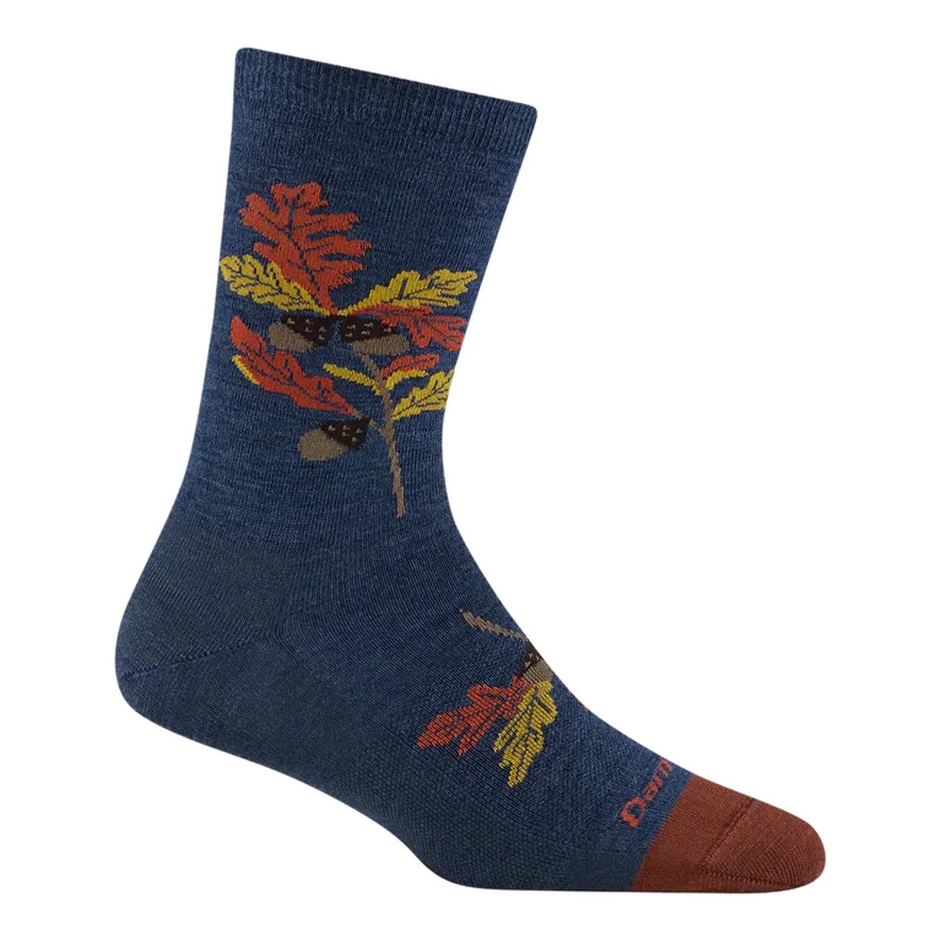 Side view of the Darn Tough Women's Blossom Crew Lightweight socks in Seafoam showing the autumn leaf design against a white background.