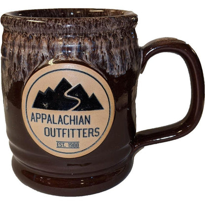 A side view of the Cranberry Deneen Pottery Appalachian Outfitters Mug showing the logo and handle against a white background.