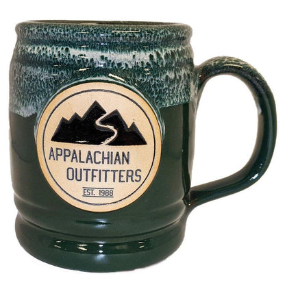 A front view of the Deneen Pottery Appalachian Outfitters Mug in Cranberry showing the logo and handle against a white background.