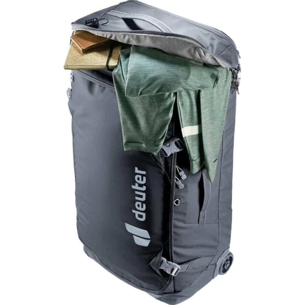 A charcoal Deuter Duffel Pro Movo 90 with a green shirt and books visible inside, photographed from the front.