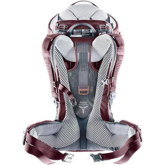 Back view of the Deuter Kid Comfort in Maroon showing the breathable mesh back panel and padded shoulder straps against a white background.