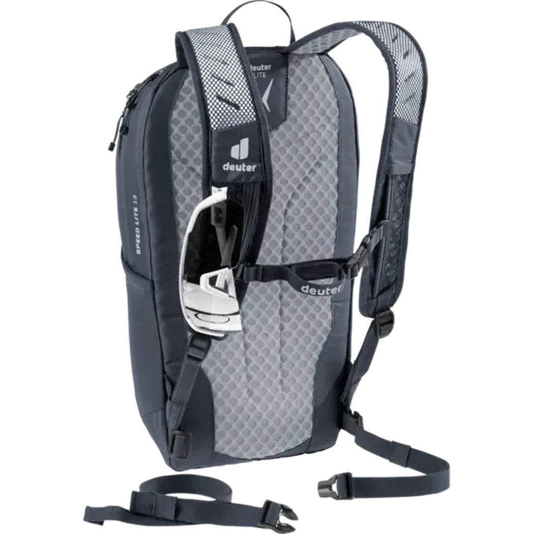 Side view of the Deuter Speed Lite 13 backpack in Atlantic Ink showing the helmet strap and padded shoulder straps against a white background.