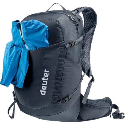 A black Deuter Speed Lite Pro 17 SL - Hydro backpack with a blue jacket in the front pocket, shown from the side against a white background.