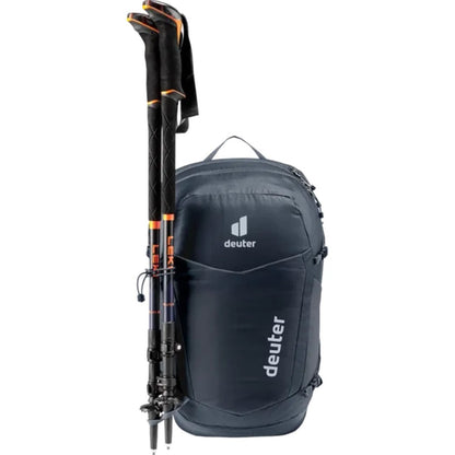 A front view of the Deuter Speed Lite Pro 17 SL - Hydro backpack in Black with trekking poles attached, against a white background.