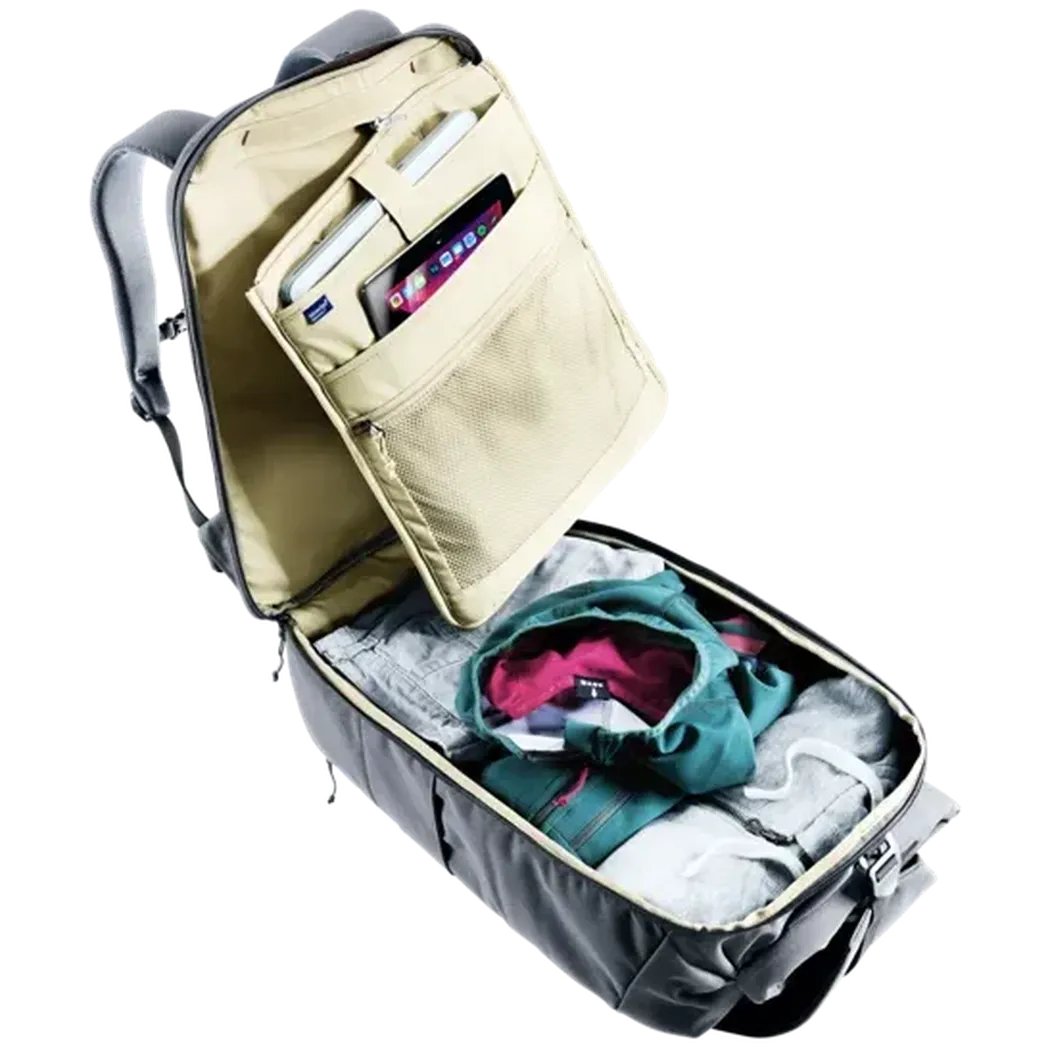 Back view of the Deuter Utilion 30 in Black showing the main compartment and front pocket with a tablet and phone inside.