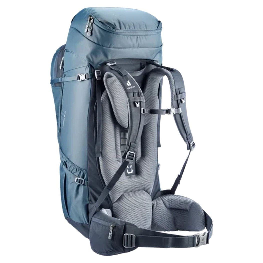 Side view of the Deuter Voyager 65+10 in Atlantic Ink showing padded shoulder straps and a white background.