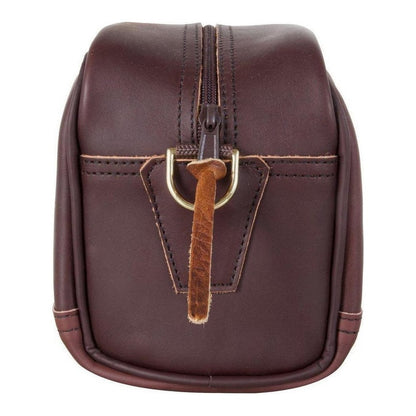 Back view of the Brown Smooth Duluth Pack Leather Sportsman's Kit Bag showing the front pocket and zipper against a white background.