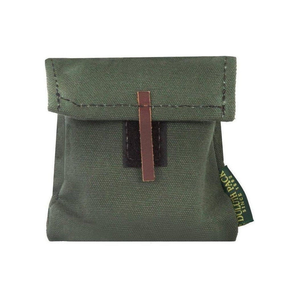 A front view of the Duluth Pack Mini Game Pack in Black showing the leather strap closure and a green tag on the side against a white background.