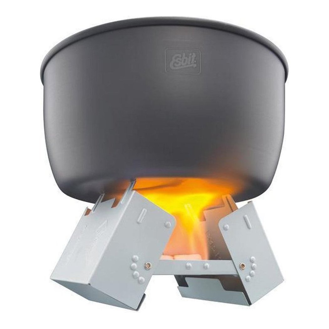 The Esbit Large Pocket Stove with a charcoal/gray pot sits above a lit flame on a white background.