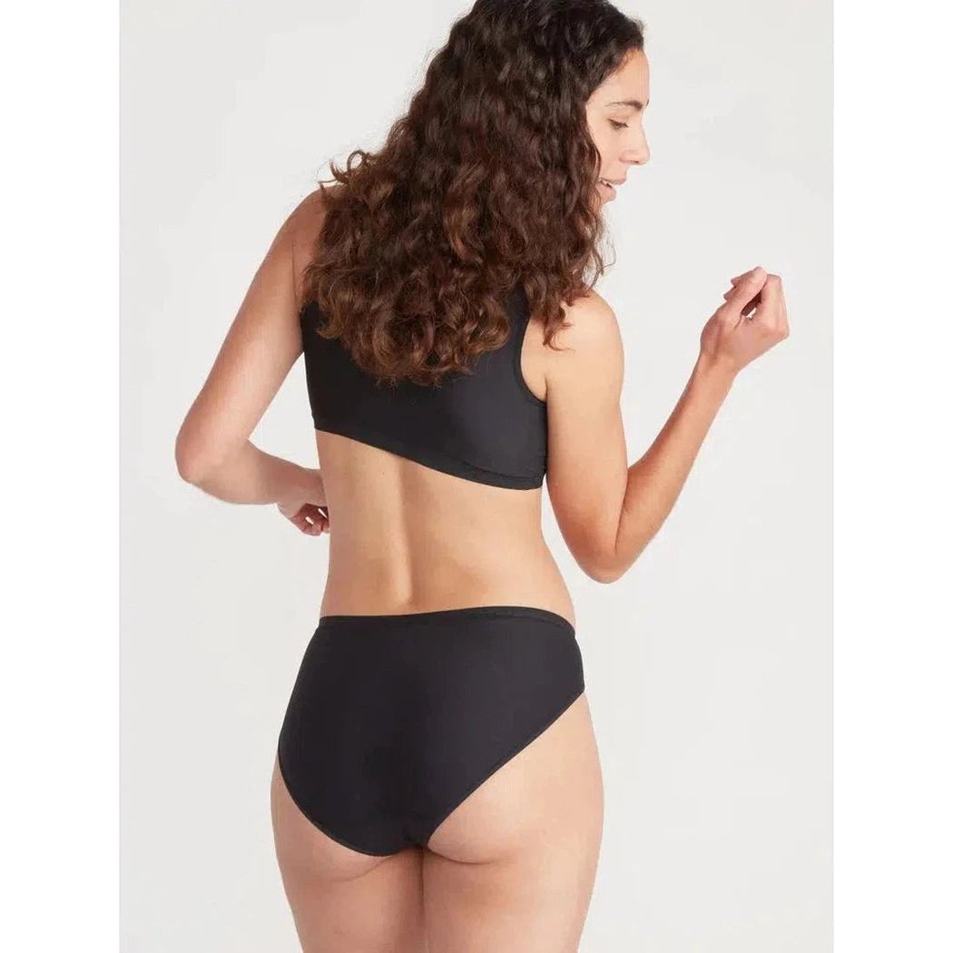 Back view of the Exofficio Women's Give-N-Go 2.0 Bikini Brief in Bellini Mosaic on a model against a plain white background.