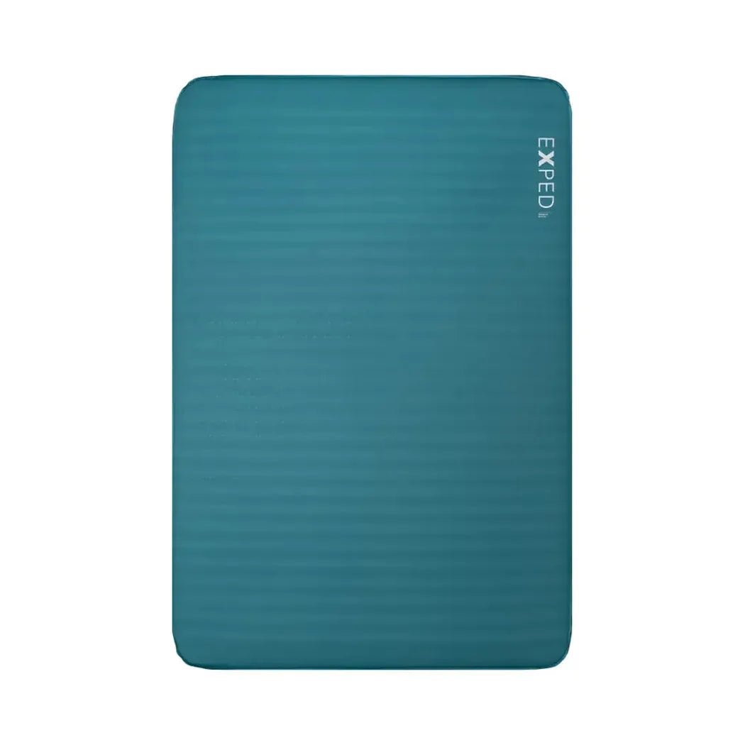 A teal Exped MegaMat Duo sleeping pad shown from the front with the brand name visible on the right side against a white background.