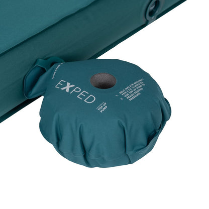 Close-up of the teal Exped MegaMat Duo showing the pump attached to the sleeping pad.