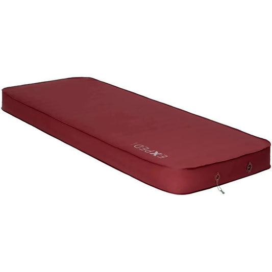 Side view of the Burgundy Exped MegaMat Max LXW showing the brand name and valve on a white background.