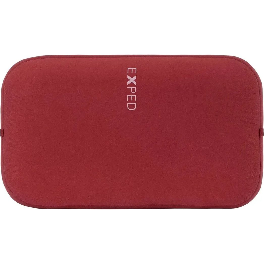 Top view of the burgundy Exped MegaPillow with the brand name visible on the front.