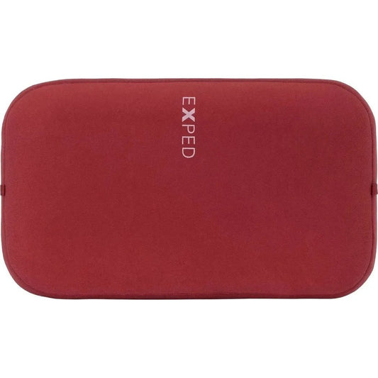 Top view of the burgundy Exped MegaPillow with the brand name visible on the front.