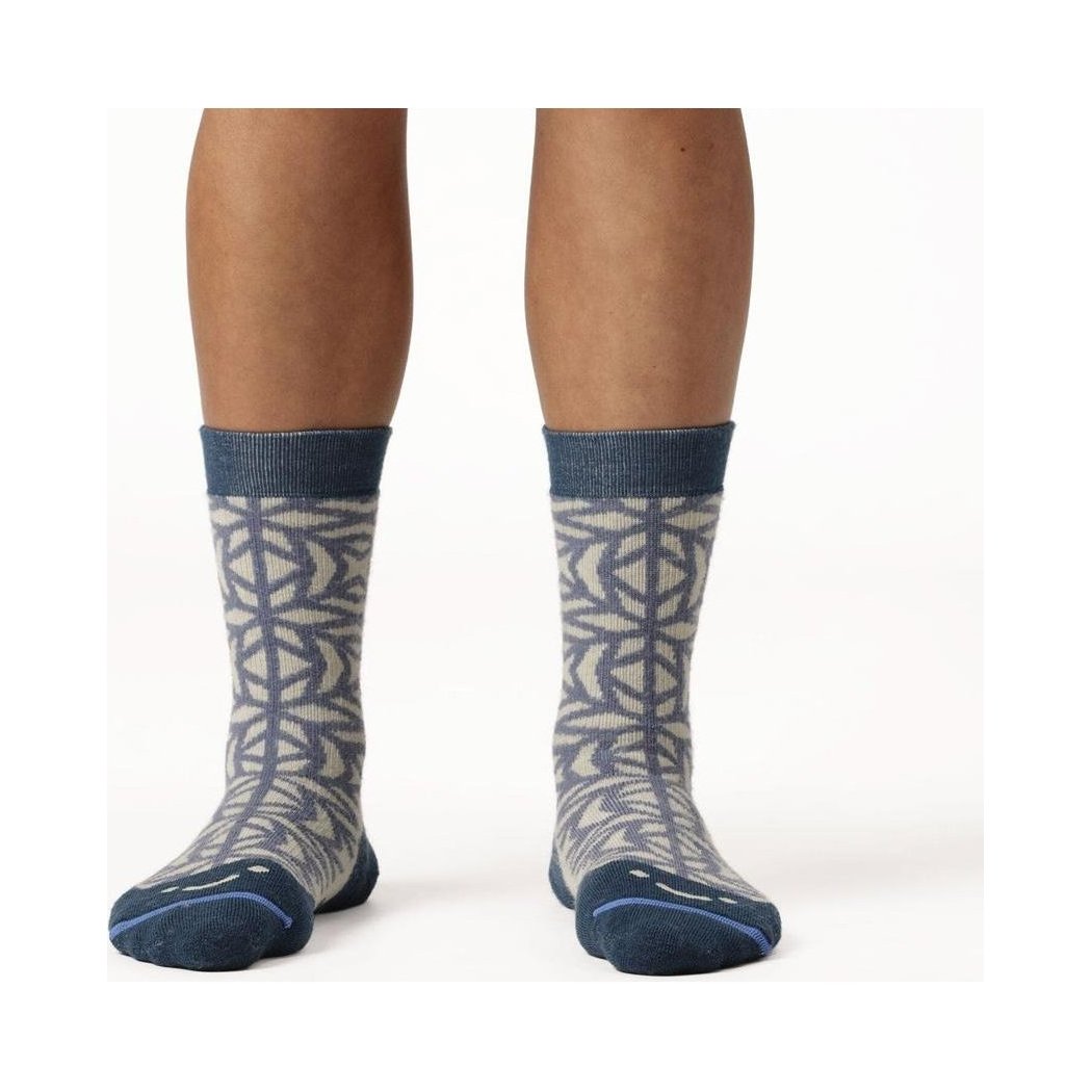 A front view of the FITS Crystal Flakes Original Fit Fullcrew socks in Desert Sage on a model against a white background.