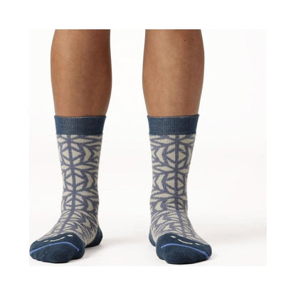 A front view of the FITS Crystal Flakes Original Fit Fullcrew socks in Desert Sage on a model against a white background.