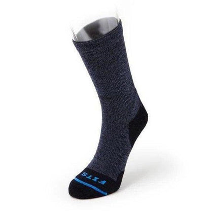 Side view of the FITS Light Hiker Crew sock in Brown with a black heel and toe against a white background.