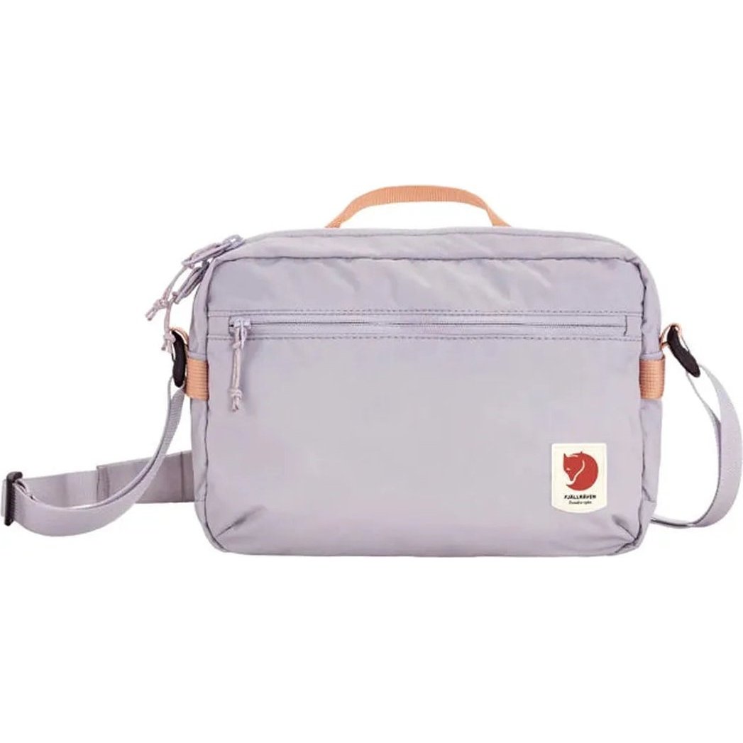 A front view of the Fjallraven High Coast Crossbody in Black with a zippered front pocket and adjustable strap against a white background.