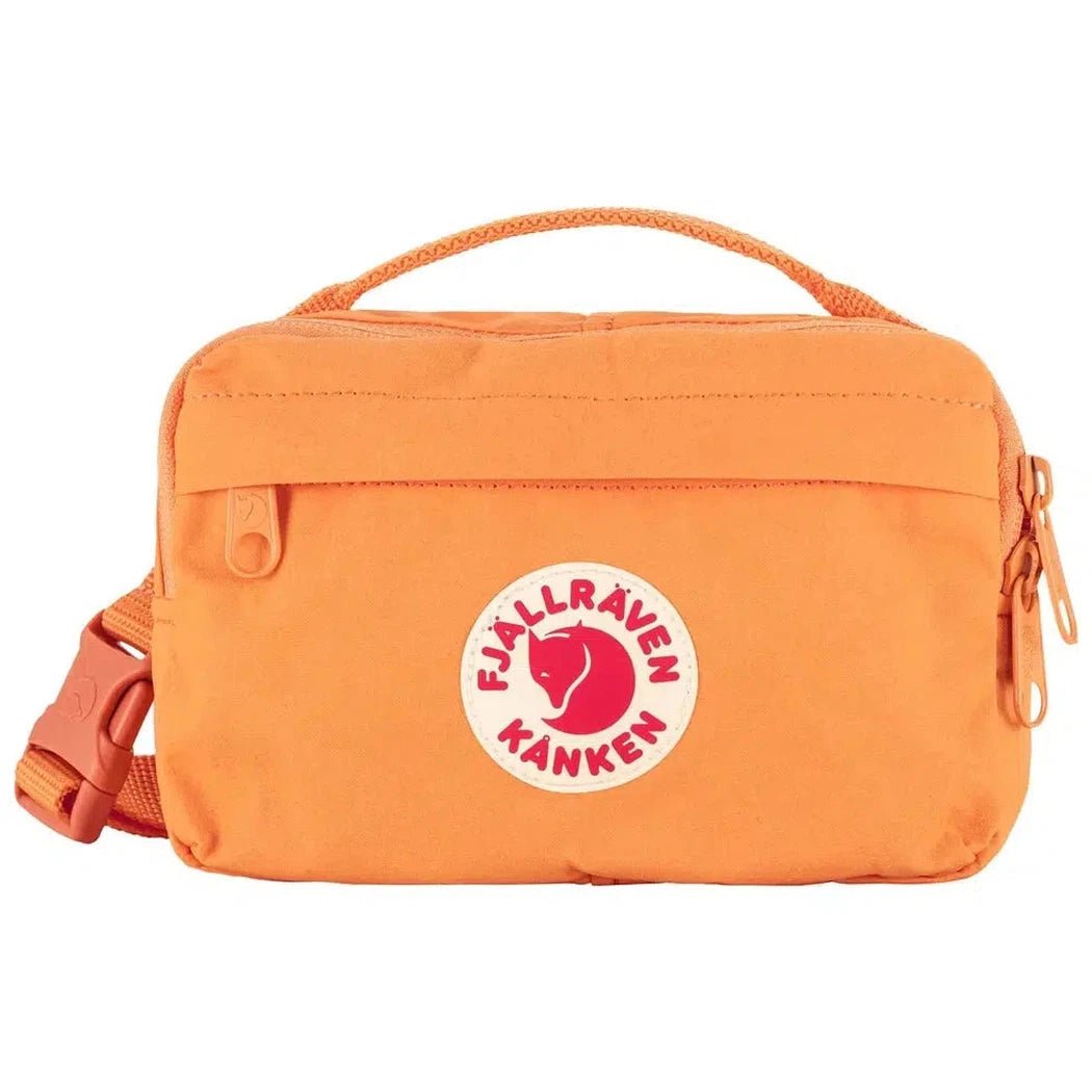 Side view of the Fjallraven Kanken Hip Pack in Green showing the logo and adjustable strap against a white background.