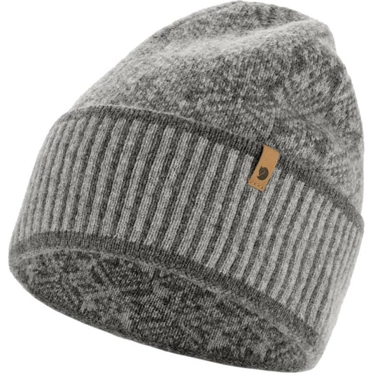 A grey Fjallraven Snow Beanie with a ribbed cuff and a leather tag, shown from a slightly angled top view against a white background.