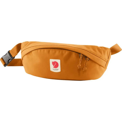 A front view of the Fjallraven Ulvo Hip Pack Medium in Black with a white background.