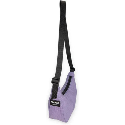 Side view of the Flowfold Mini Culter Crossbody in Coal EcoGrid showing the adjustable strap and front zip pocket against a white background.
