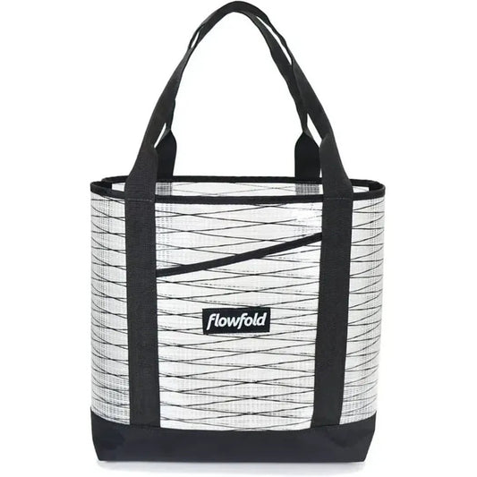 A front view of the Flowfold Recycled Sailcloth Porter Tote in Grey with black straps and a black bottom.