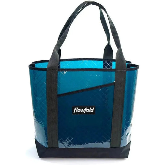 A front view of the Flowfold Recycled Sailcloth Porter Tote in Grey with black straps and a black base against a white background.