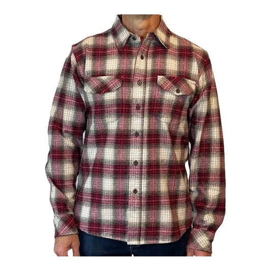 A front view of the Flyshacker Men's Granby Flannel Shirt - 8 oz in RDE, showing the chest pockets and button front on a model wearing dark jeans against a white background.