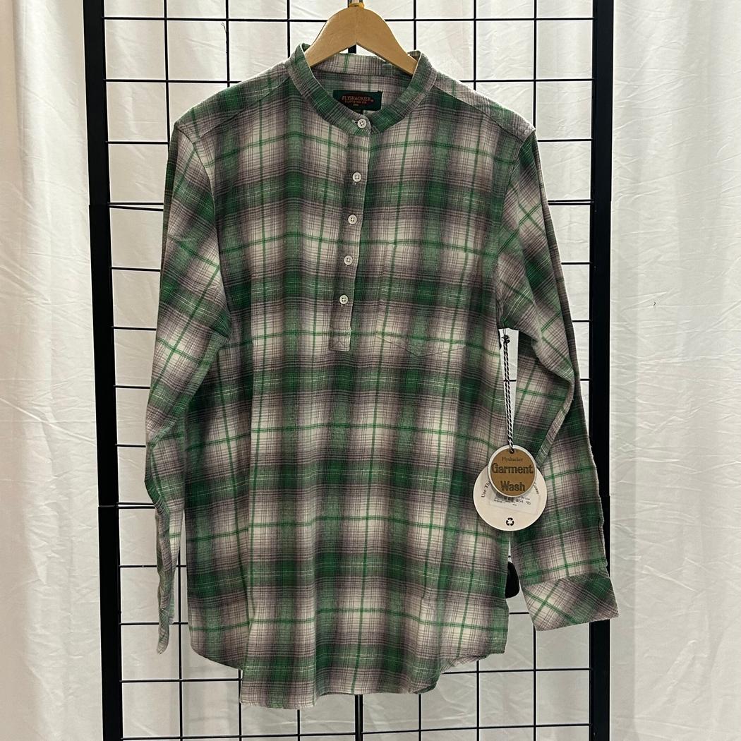 A women's Granddad shirt in GRM/GRY/DMB hangs on a wooden hanger against a grid background with a tag visible.