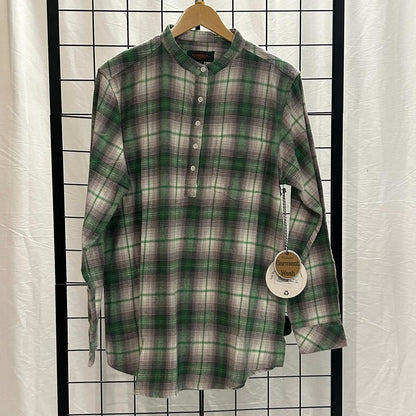 A women's Granddad shirt in GRM/GRY/DMB hangs on a wooden hanger against a grid background with a tag visible.