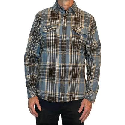 A front view of the Flyshacker South Fork Shirt in Blue on a model wearing dark pants against a white background.