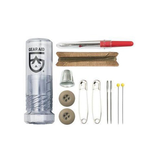 A top-down view of the Gear Aid Outdoor Sewing Kit with a red handled tool, brown zipper, and metal thimble visible against a white background.
