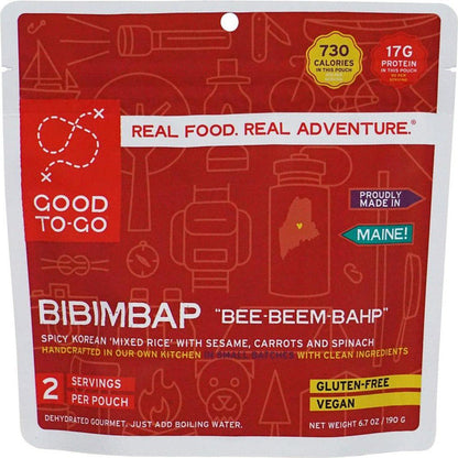 A red Good To-Go Bibimbap backpacking food pouch showing "Real Food. Real Adventure." and "Proudly Made in Maine!