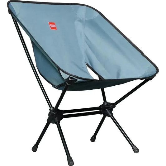 A side view of the Grand Trunk Caddis HD Chair in Storm Blue showing the foldable frame and black legs against a white background.