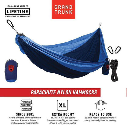 Side view of the Grand Trunk Double Parachute Nylon Hammock with Straps in Green/Blue showing the straps and storage bag against a white background.