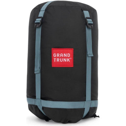 A front view of the Grand Trunk Evolution Down Hammock bag in black with blue straps and a red logo against a white background.