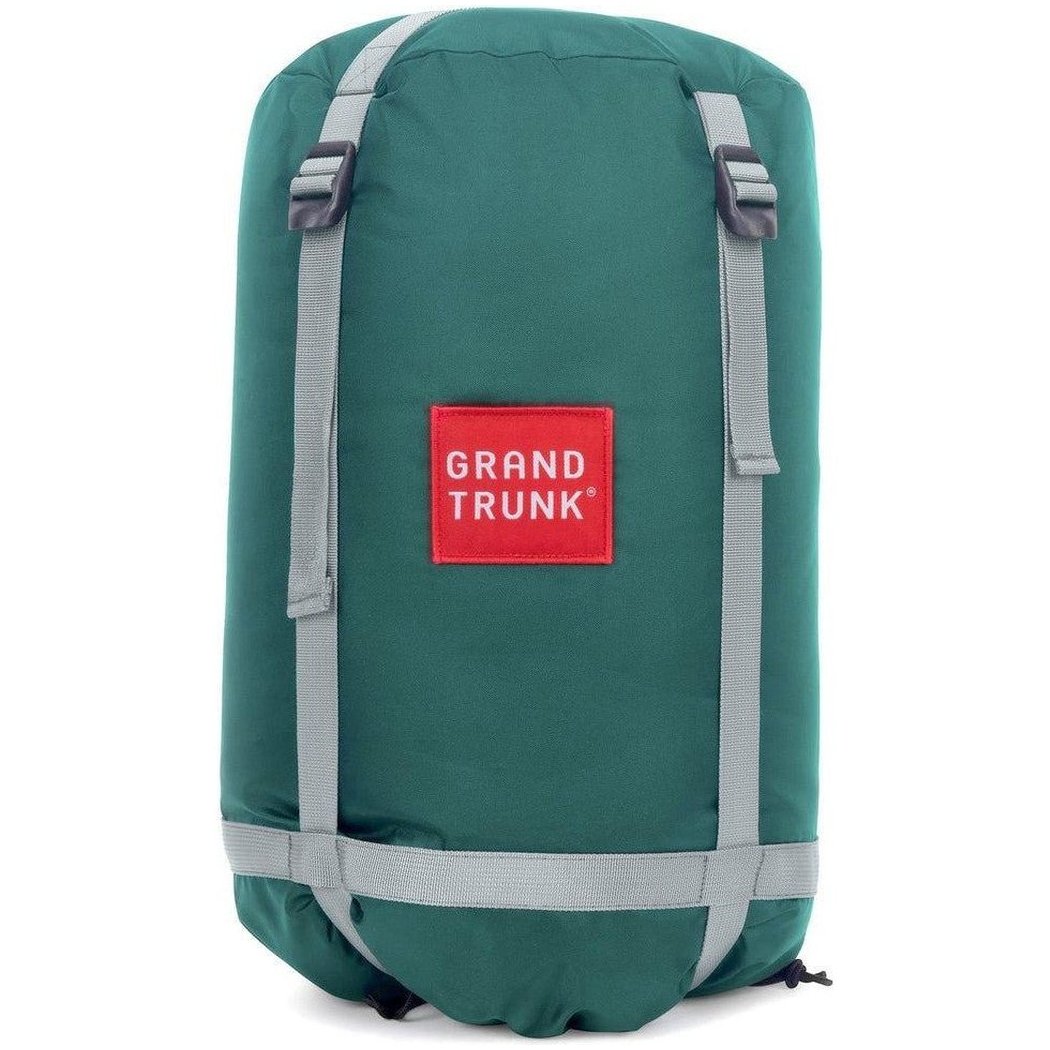A front view of the Grand Trunk Evolution Synthetic Hammock in forest green with gray straps and a red logo patch against a white background.