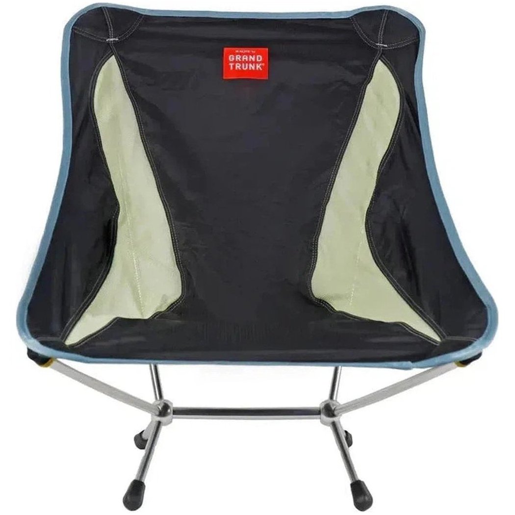 A front view of the Grand Trunk Mantis camping chair in Black with light green accents and a silver frame.