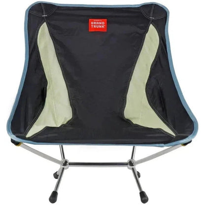 A front view of the Grand Trunk Mantis camping chair in Black with light green accents and a silver frame.