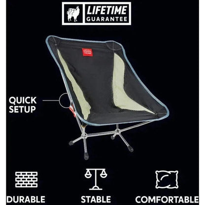 A black Grand Trunk Mantis camping chair with a Lifetime Guarantee, showing quick setup and durable/stable/comfortable features against a black background.