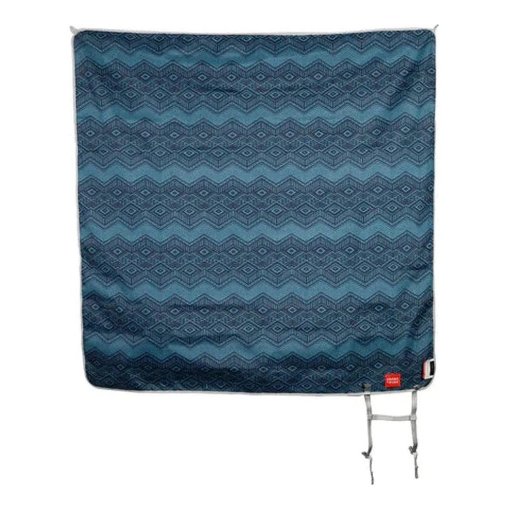 A top-down view of the Grand Trunk Meadow Mat in Horizon color showing its geometric pattern and metal tie-downs.