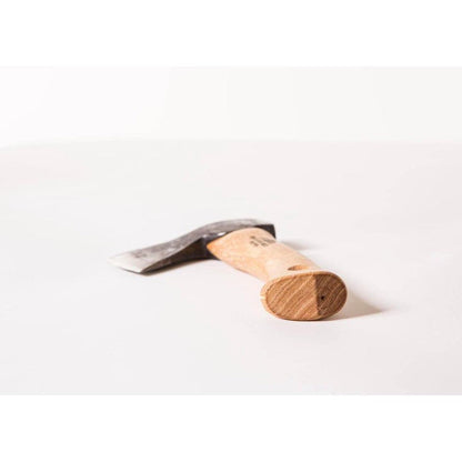 A close-up of the Gransfors Bruk Hand Hatchet with a wooden handle and metal head on a plain white background.