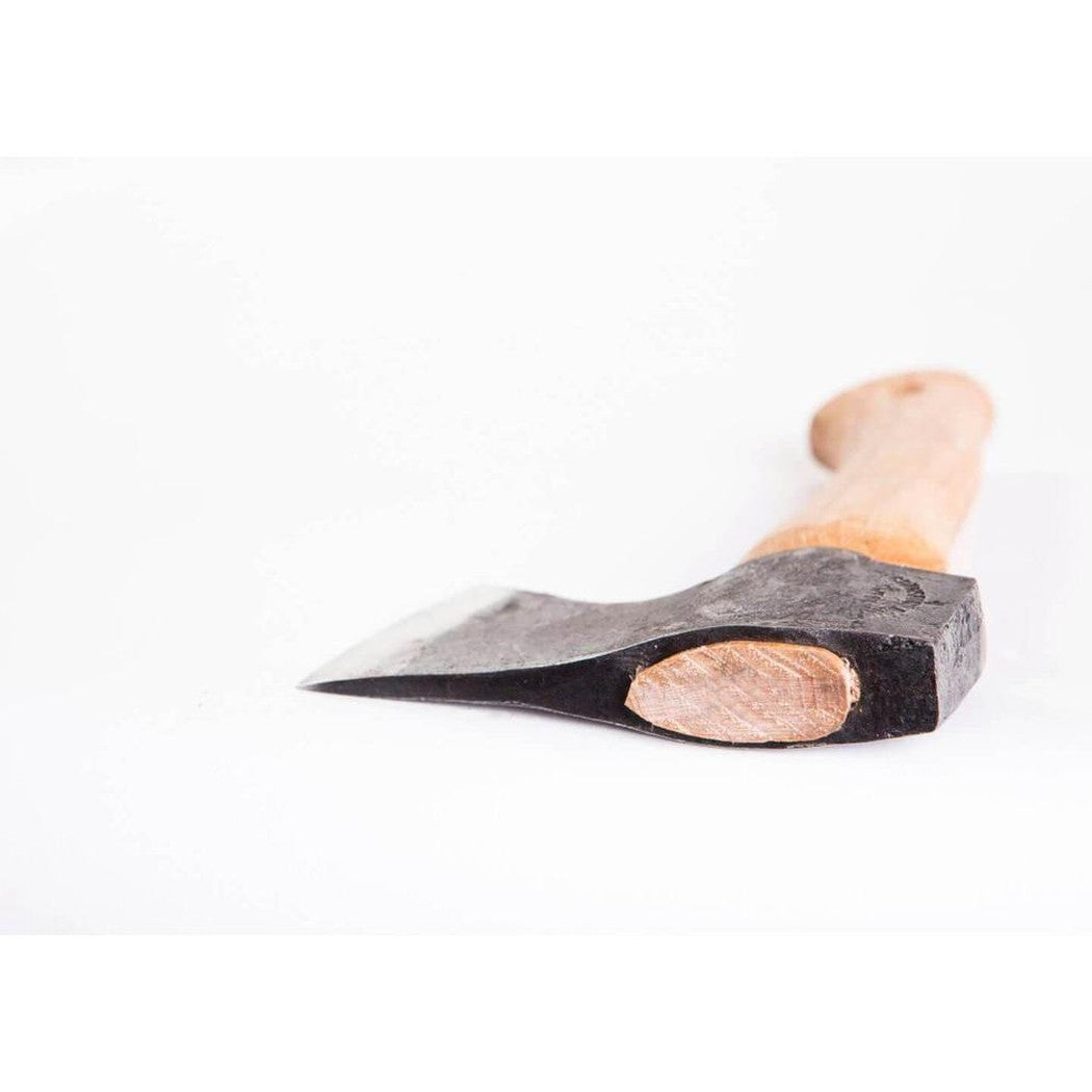 A close-up of the Gransfors Bruk Hand Hatchet with a wooden handle and charcoal-colored metal head, photographed against a white background.