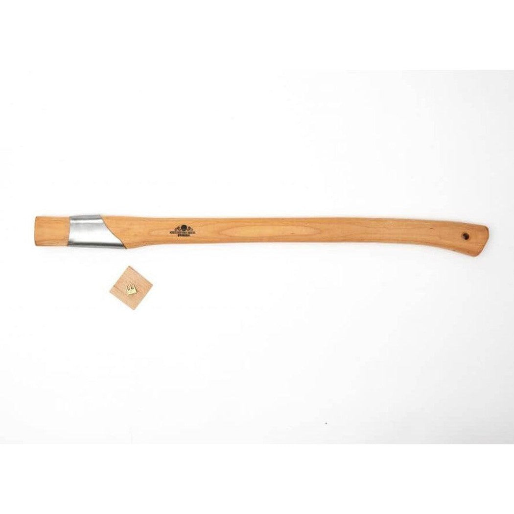A long wooden Gransfors Bruk Handle for Large Splitting Axe lies horizontally on a white background with a small wooden tag nearby.