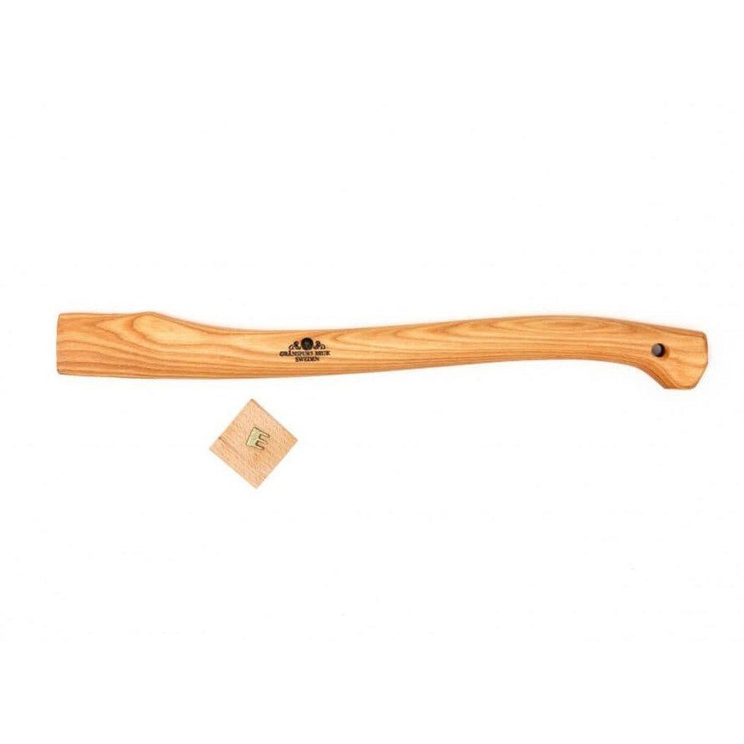 A natural wood Gransfors Bruk Handle for Small Forest Axe with a small wooden tag below it on a white background.